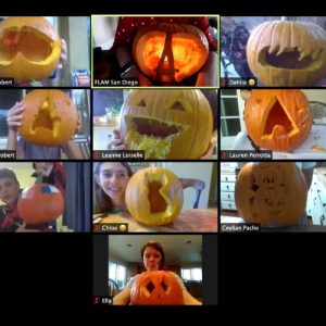 Several kids showing their carved pumpkins and jack lanterns on their Zoom French activities.