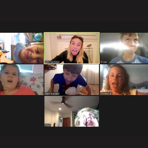 A French teacher and her students in a zoom call doing funny faces.